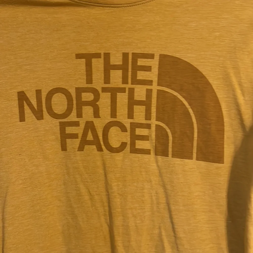 North Face yellow tee shirt